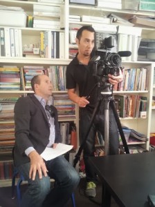 Brian Greenberg and Eric Wong discuss a camera angle during a film shoot at KIPP LA. Photo by Michael Horn.